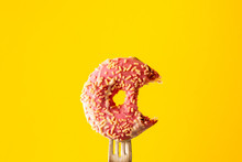 Pink Icing-covered Doughnut