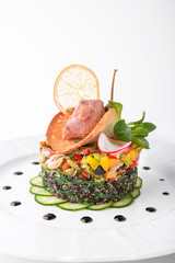 Salad of quinoa, seaweed, meat, vegetables and pumpkin seeds. Dietary, wholesome and tasty. Banquet festive dishes. Gourmet restaurant menu. White background.