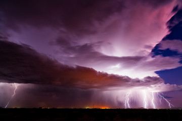 Wall Mural - Lightning bolts strike in a thunderstorm