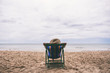 © Farknot Architect - A woman lying down on a beach chair with feeling relaxed