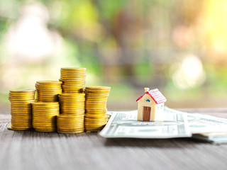 Estate service concept,Saving money for real estate with buying a new home and loan for prepare in the future concept.