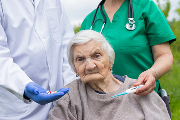 Poster - Portrait of elderly woman with dementia disease