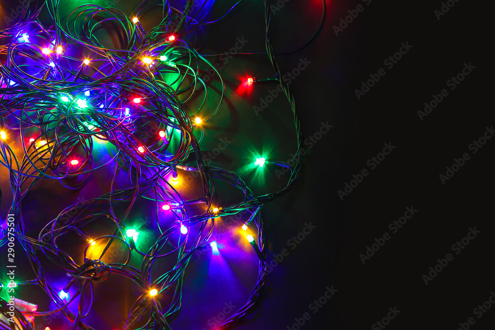 Beautiful Christmas lights on dark background