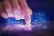 © ra2 studio - Finger touching tablet with web technology icons and TECHNOLOGY NEWS inscription