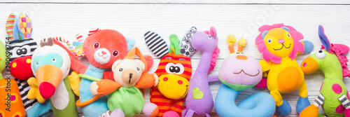 Fotomural Colorful kids toys frame on wooden background