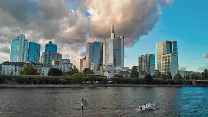 Poster - Frankfurt/Main Skyline Aerial Drone Shot At Sunset, view along the river