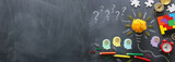 Education concept image. Creative idea and innovation. Crumpled paper as light bulb metaphor over blackboard