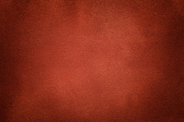 Sticker - Background of dark orange suede fabric closeup. Velvet matt texture of ginger nubuck textile