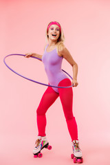 Sticker - Image of smiling blonde woman doing exercise with hula hoop