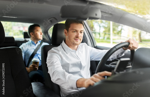 Fotografía transport, vehicle and people concept - male driver driving car with passenger