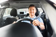 transport, vehicle and people concept - smiling man or driver driving car
