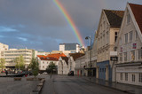 Fototapeta Tęcza - Stavanger, Norway - July 2019: The harbour in Stavanger city. This area is called Vagen. Evening with the rainbow