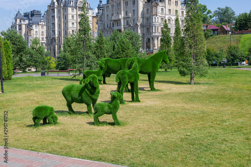 Pet Figures Created From Bushes In Green Animals Topiary Gardens