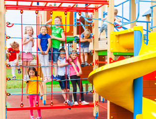 Wall Mural - Amusement park and kids playing and climbing