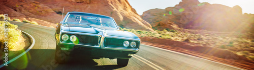 Cuadros en Lienzo driving fast through desert in vintage hot rod car