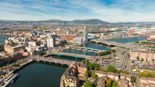 Aerial View On River And Buildings In City Center Of Belfast Northern Ireland. Drone Photo, High Angle View Of Town 