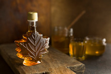 Maple Canadian Syrup In A Glass Bottle.