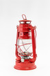 Red kerosine lamp. Isolated on white background