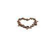 Heart-shaped coffee beans (shallow depth of field). Isolated on a white background.