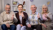 © motortion - Smiling elderly people showing thumbs up on camera, social reform improvement