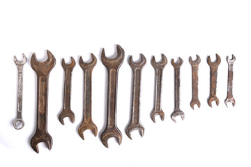 Wall Mural - Old rusty stainless steel crescent wrench isolated on white top view