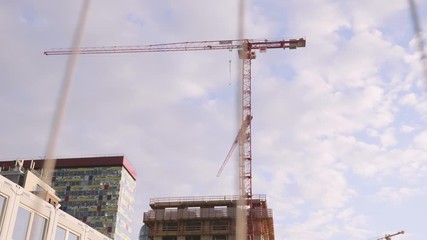 Wall Mural - Cranes Working on Construction Site