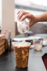 Wall Mural - ice latte coffee in plastic glass