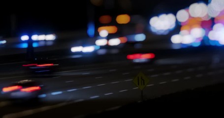 Poster - timelapse of highway traffic by night with speeding cars - busy traffic on highway road with blurred
