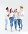 © Pixel-Shot - Group of young people in stylish casual clothes on white background