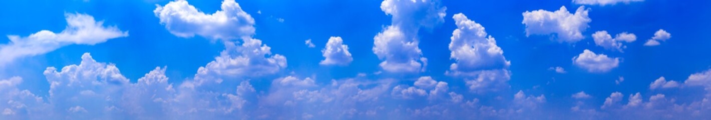 Wall Mural - Blue sky with tiny clouds. Panorama