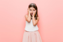 Little Girl Wearing A Princess Look Whining And Crying Disconsolately.