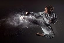 Karate Girl Bounces And Makes A Kick