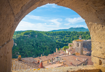 Wall Mural - Sorano (Italy) - An ancient medieval hill town hanging from a tuff stone in province of Grosseto, Tuscany region, know as the Little Matera.