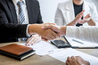 © Ngampol - Successful job interview, Image of Boss employer committee or recruiter in suit and new employee shaking hands and clap after good deal negotiation interviewing, career and placement concept