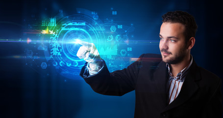 Poster - Man touching hologram screen displaying medical symbols and charts