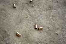 9 Mm Bullet Shells Lying On The Ground
