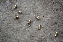 9 Mm Bullet Shells Lying On The Ground