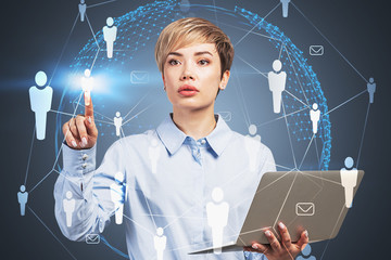 Woman with laptop working with HR icons