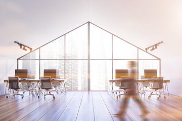 Wall Mural - Businessman walking in white attic office