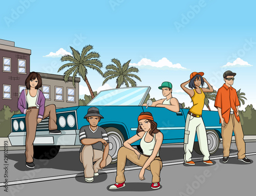 Hispanic young people in front of a lowrider car. Vintage car in the city.