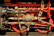 triebwerk einer dampflokomotive in rot