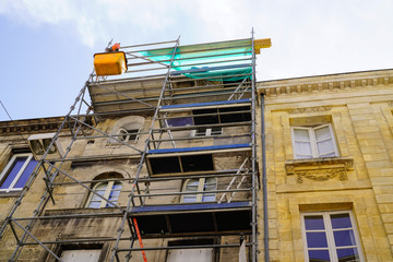 reconstruction with scaffolding old building in bordeaux france