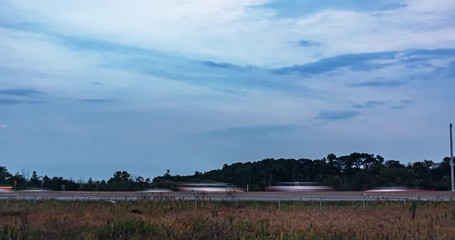 Poster - timelapse of highway traffic with speeding cars - busy traffic on highway road with blurred cars, lo