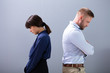 © Andrey Popov - Depressed Man And Woman Standing Back To Back