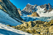 © Stewart - Walking on the ice and rocks of Franz Josef Glacier in the Southern Alps of New Zealand