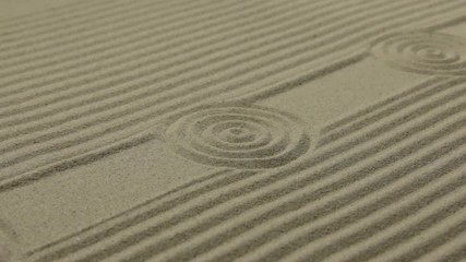 Wall Mural - Circles and lines on the sand. Texture of sand. Slider shot.