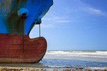  Industrial Sea Vessel Shipwreck On Coastline After Storm Accident.