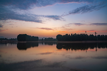 Poster - Evening glow in the sky and water