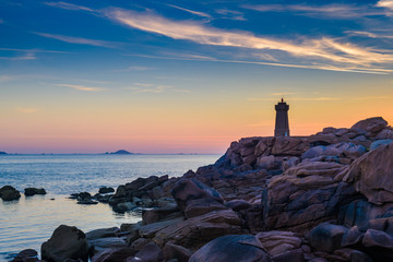 The incredible Pink Granite Shore near the village of Plumanach at sunrise.The coast of Pink Granite is a unique place in Brittany. France