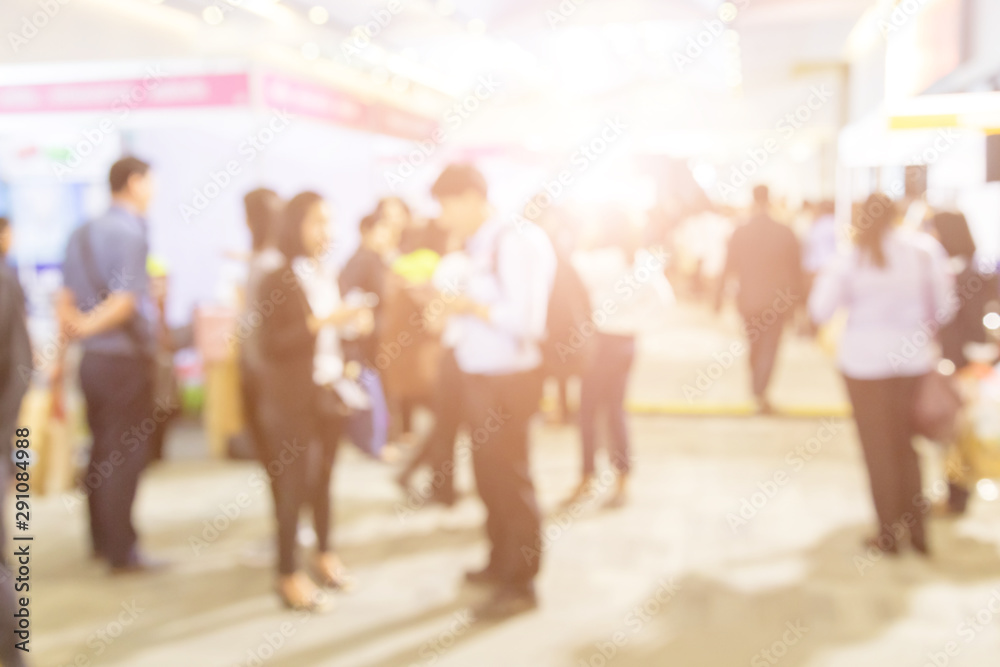 Blurred background of  public exhibition hall. Business tradeshow, job fair, or stock market. Organization or company event, commercial trading, or shopping mall marketing advertisement concept - obrazy, fototapety, plakaty 
